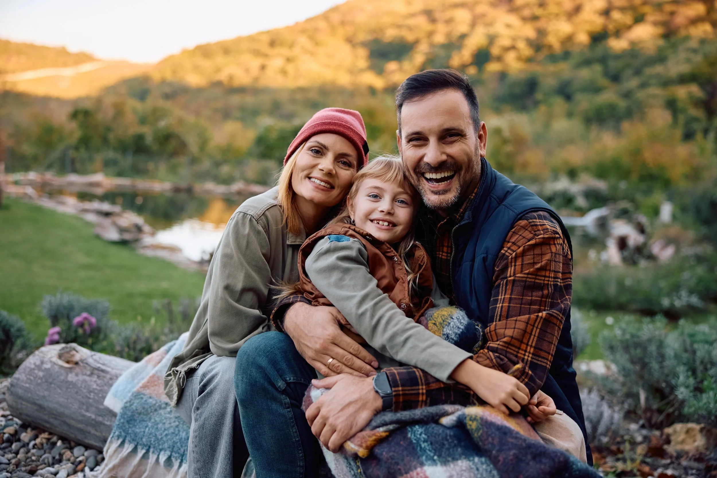 portrait-of-happy-family-during-autumn-day-in-natu-2026-01-06-10-30-54-utc.jpg