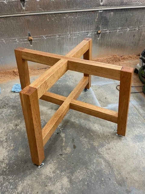 Solid cherry cross leg table base under construction. 