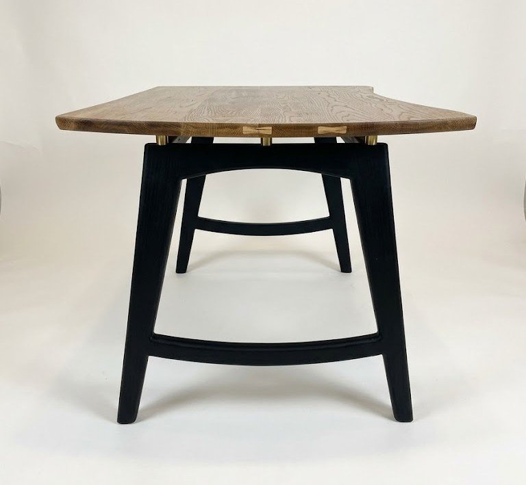 curved-oak-desk-with-brass-standoffs-curved-black-legs.jpg