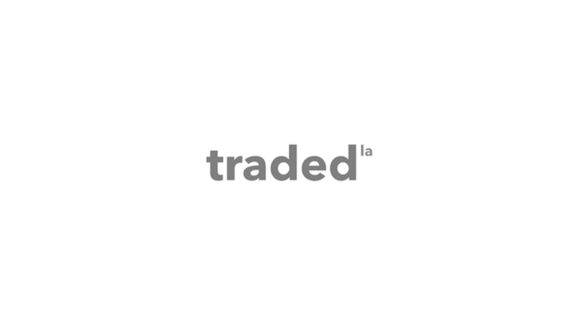 Black background with gray text that reads "traded" and a horizontal gray line extending to the right of the text.