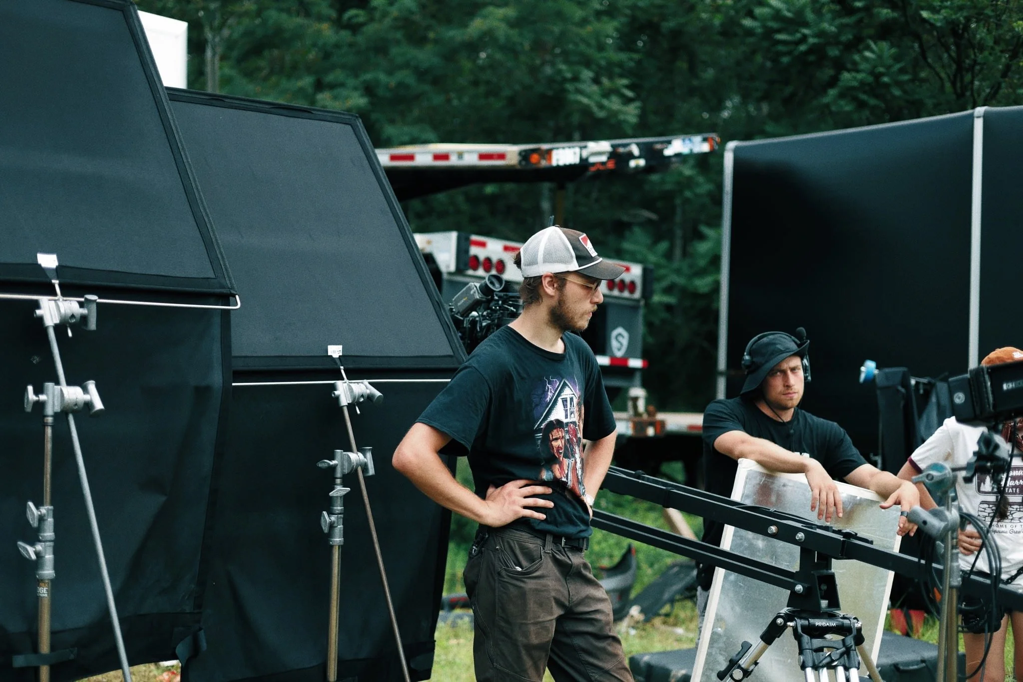 Grip Jamo (CENTER) & Gaffer Sean Gassaway (RIGHT) ready for another take. 