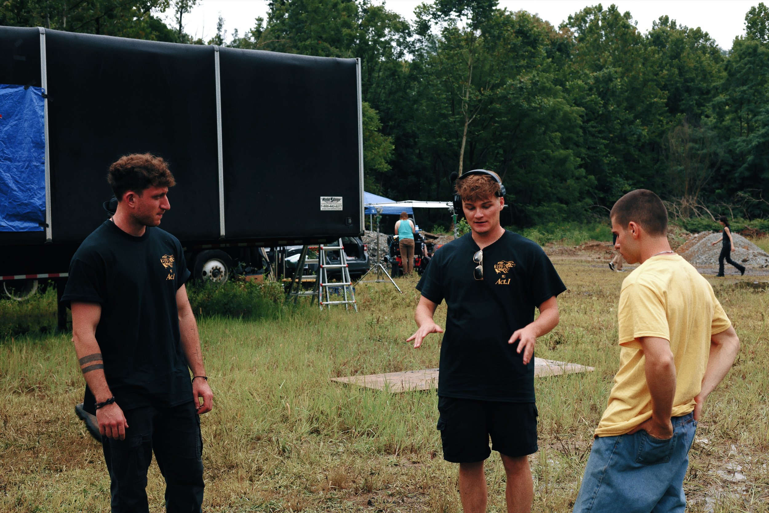 Stunt Coordinator Umi (LEFT) & Actor Nicholas Ceniti (RIGHT) converse w/ Director Constantine Kontos (CENTER). 