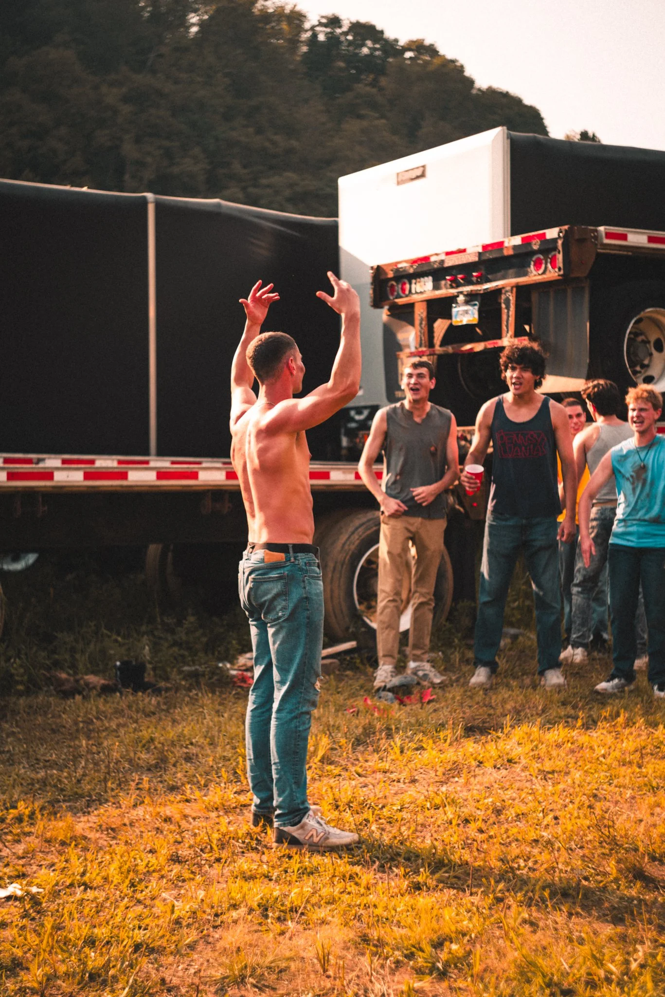 Actor Elijah Santoro getting the crowd hyped-up during a take. 