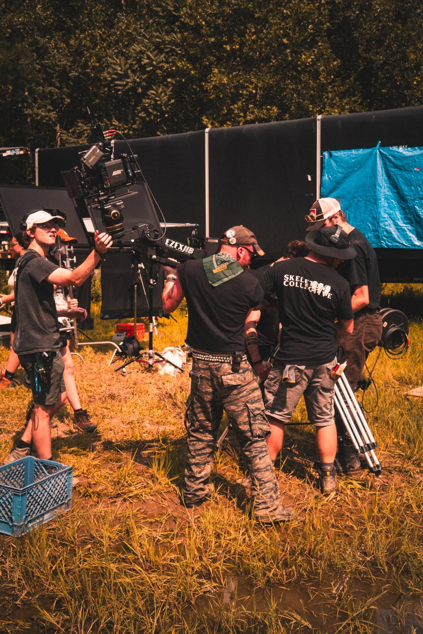 1st AC Kade Nicholson, Key Grip Ethan Brown, Gaffer Sean Gassaway, and Grip Jamo setting up the jib. 
