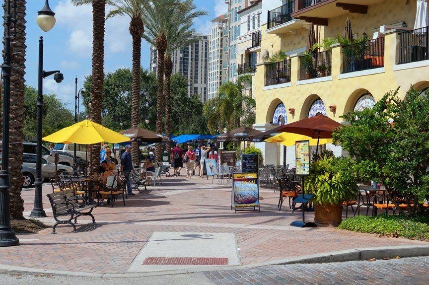 Outdoor dining and palm-lined streets in downtown St. Petersburg, Florida