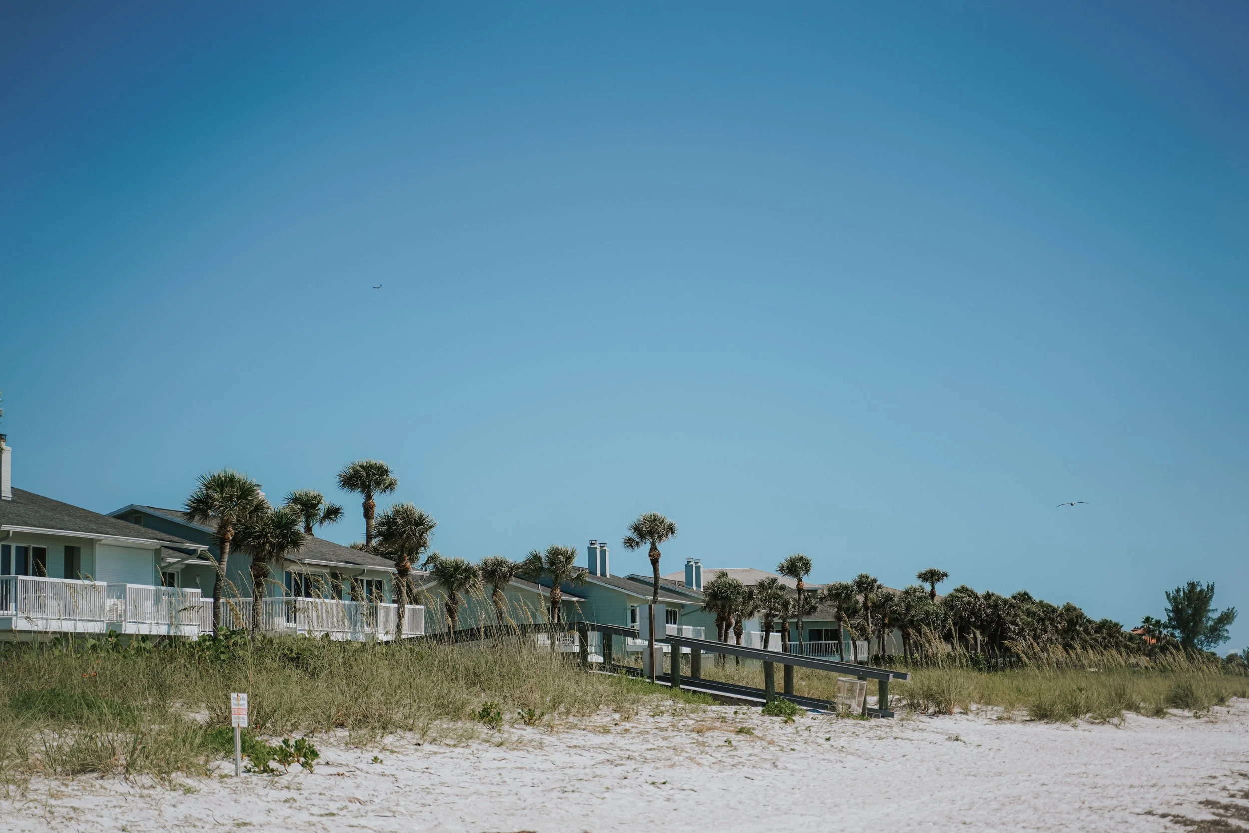 Beachfront homes along the sandy shoreline in Belleair Beach, Florida