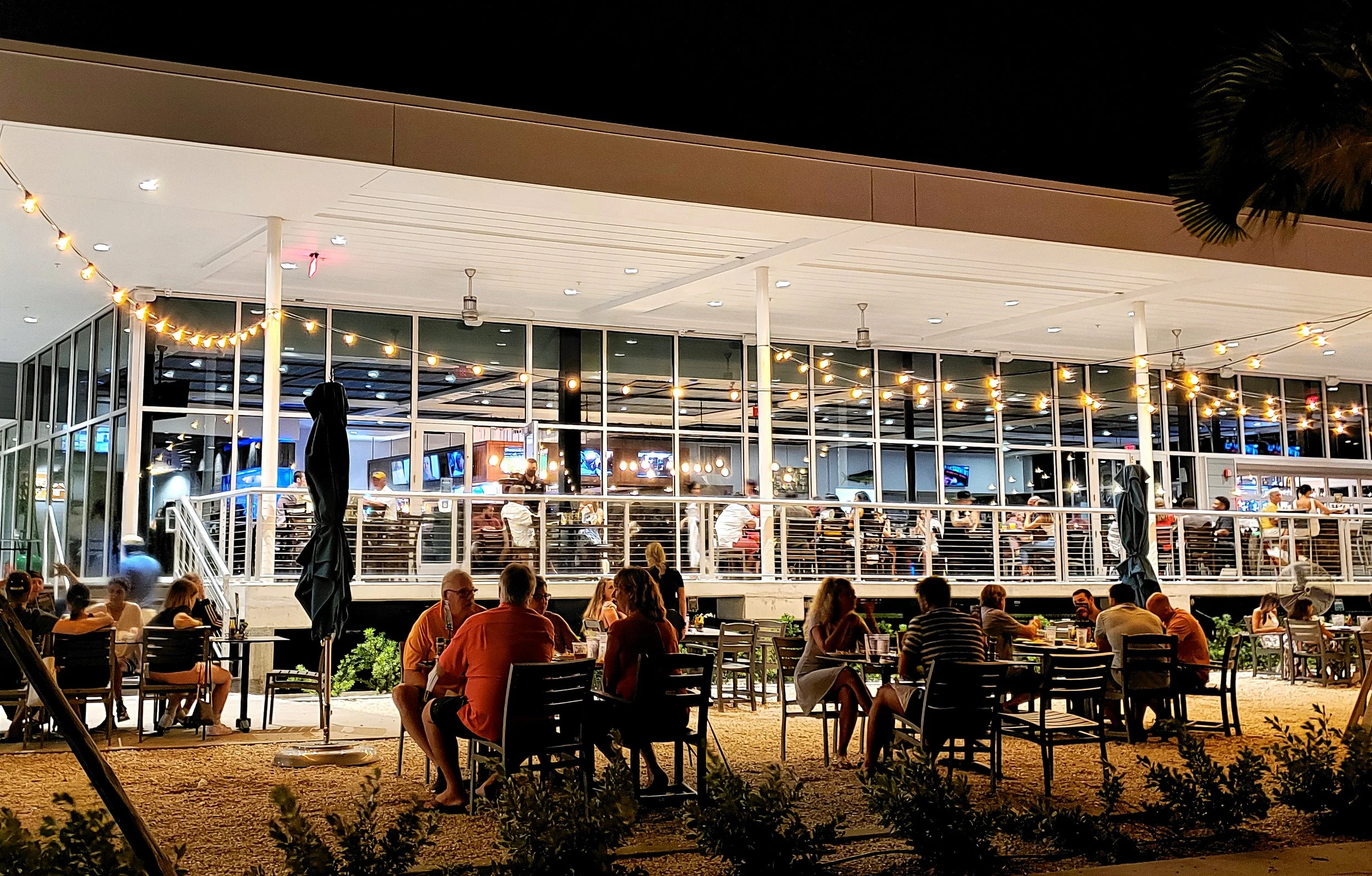 Outdoor restaurant dining at night in St. Petersburg, Florida