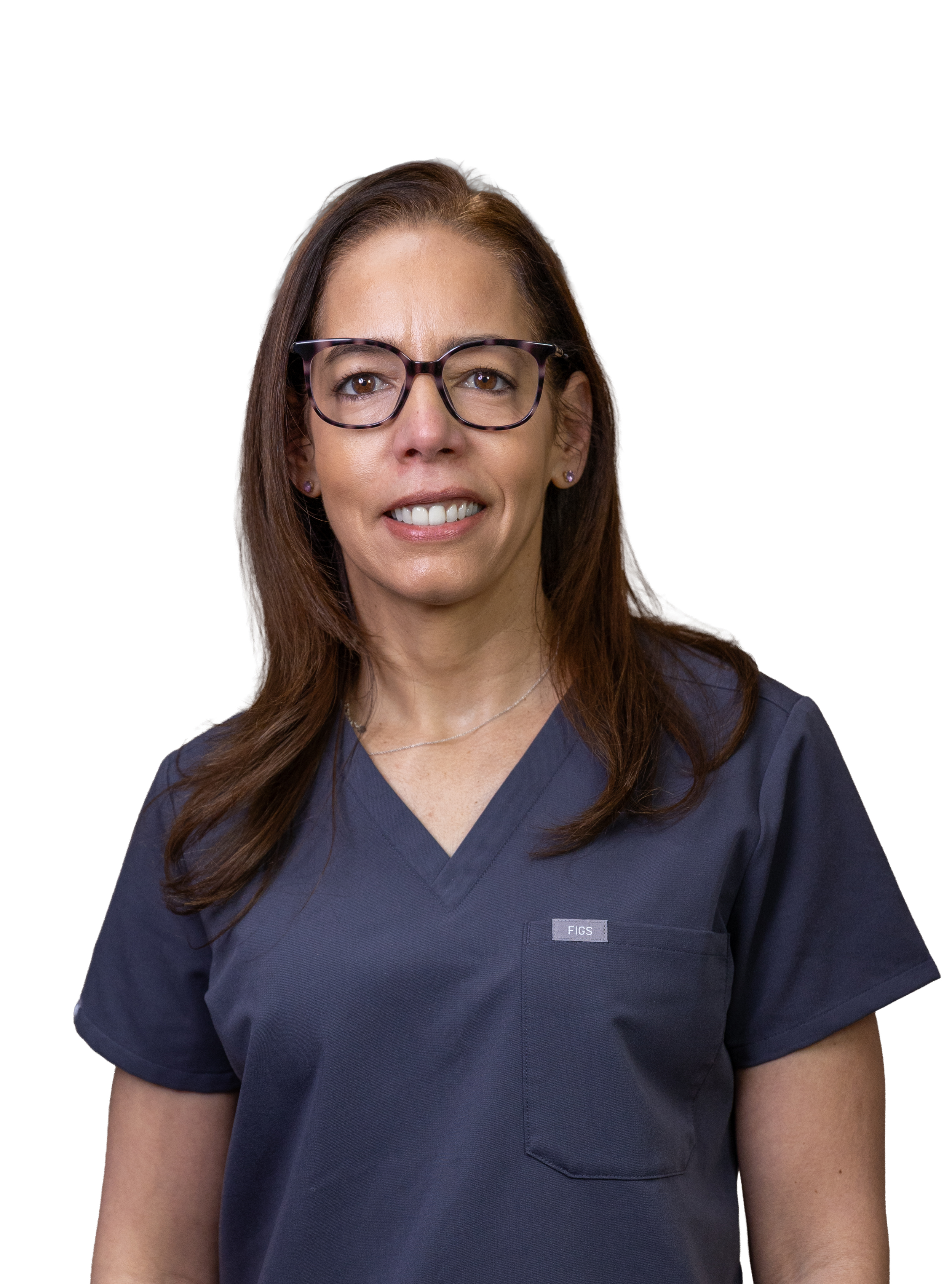 A woman wearing glasses and a navy blue medical uniform with a name tag that reads 'FIGS'.