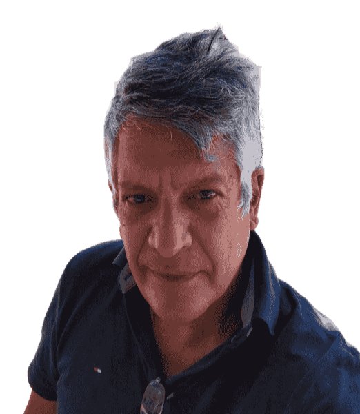 A middle-aged man with gray hair, wearing a navy blue shirt, looking at the camera with a slight smile.