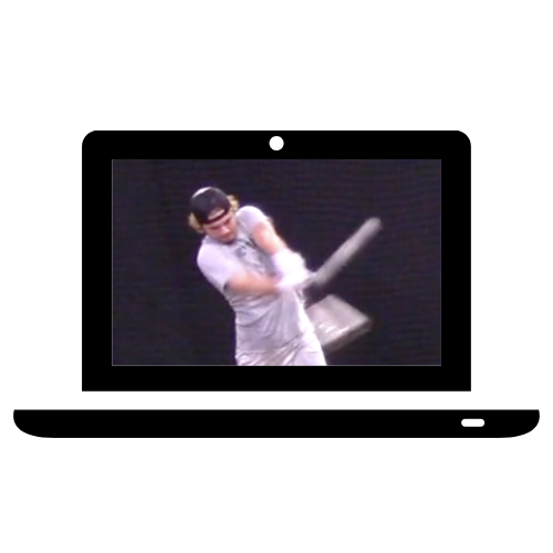 Person in white shirt with safety glasses swinging a baseball bat at a baseball with a black background.