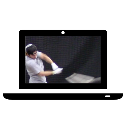 Young man practicing golf swings in an indoor golf simulator.