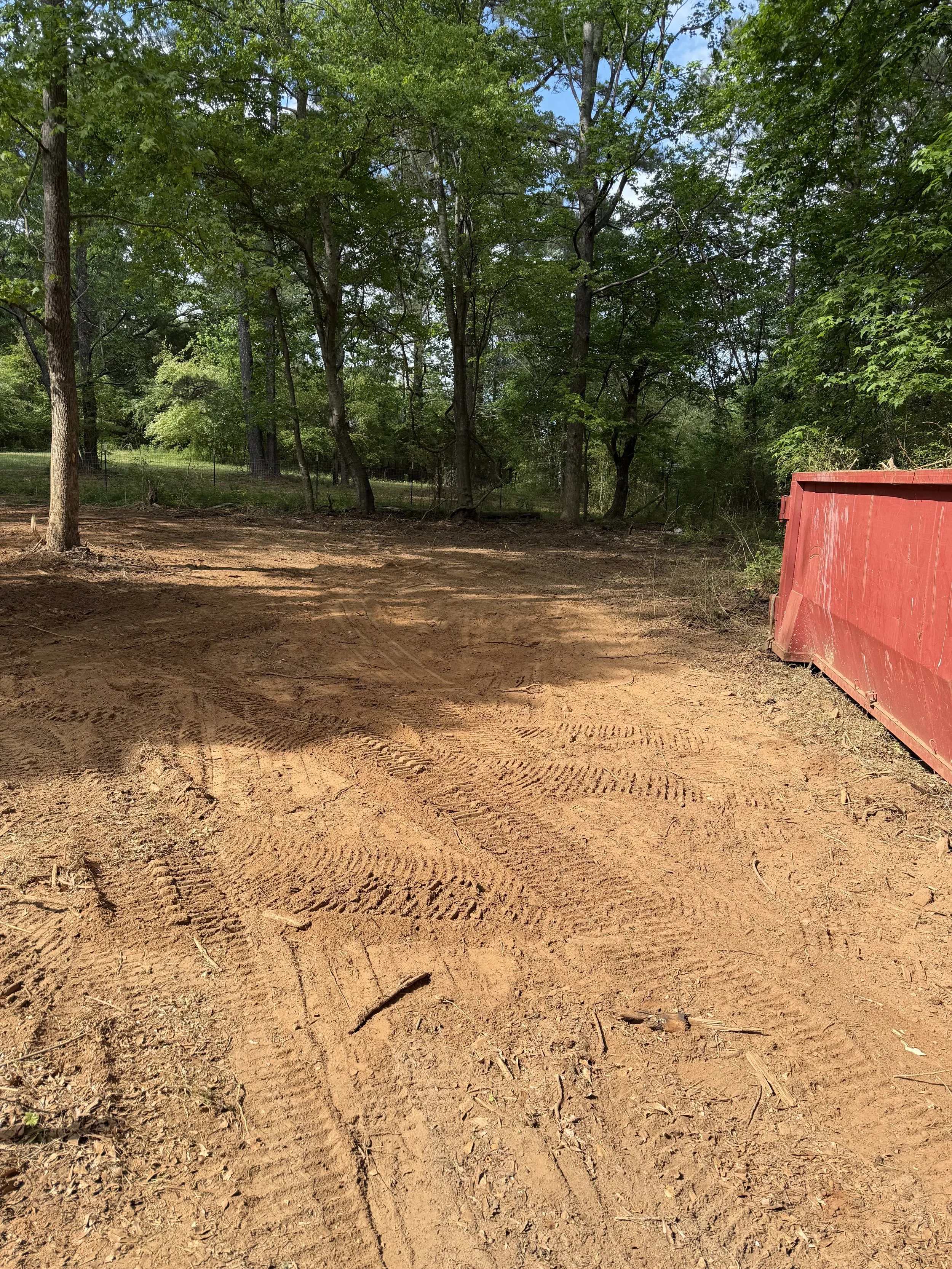 Land clearing and property grading completed to create a clean, build-ready site for future development in Middle Georgia.