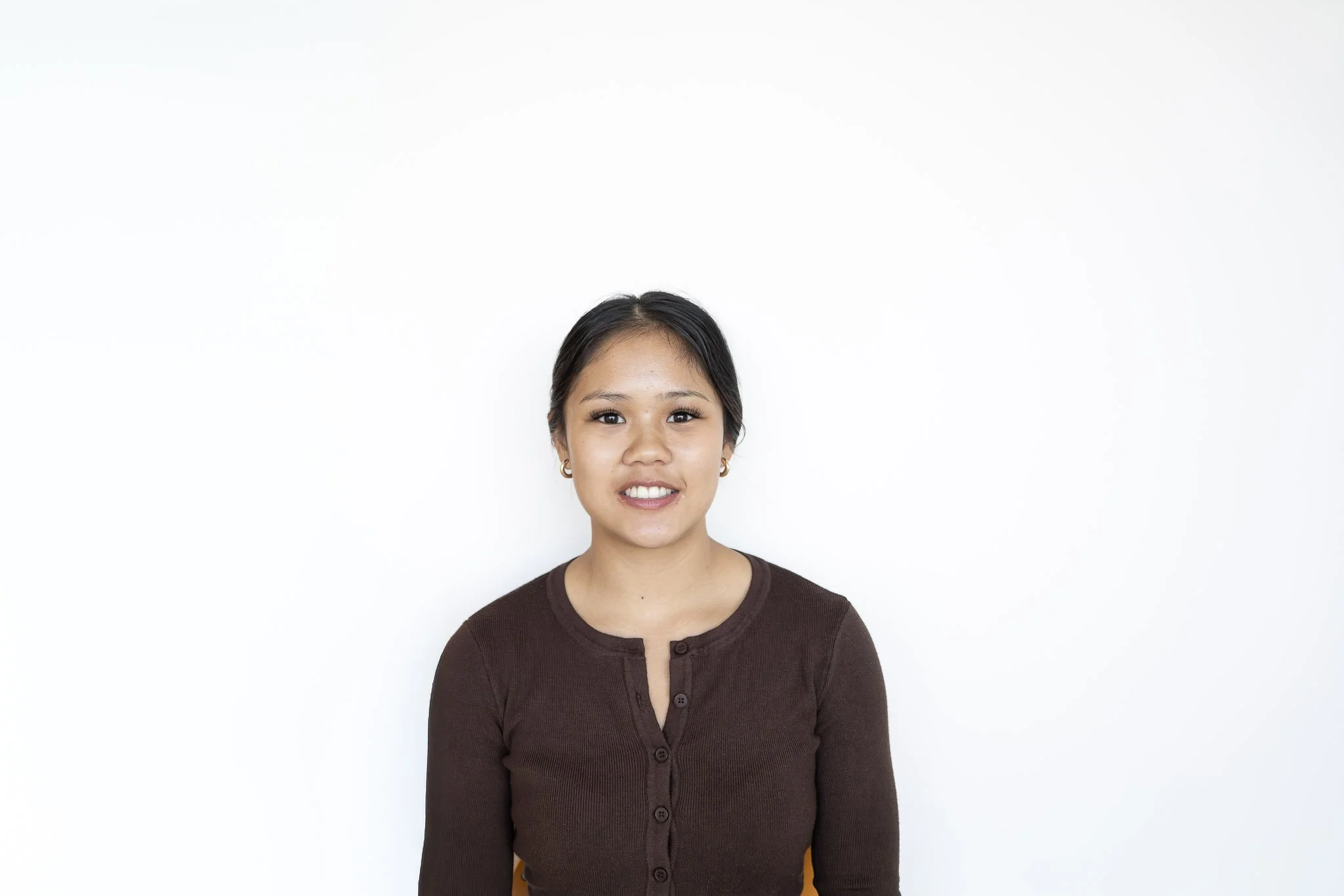 Portrait of one of our receptionist, Emma Del Rosario