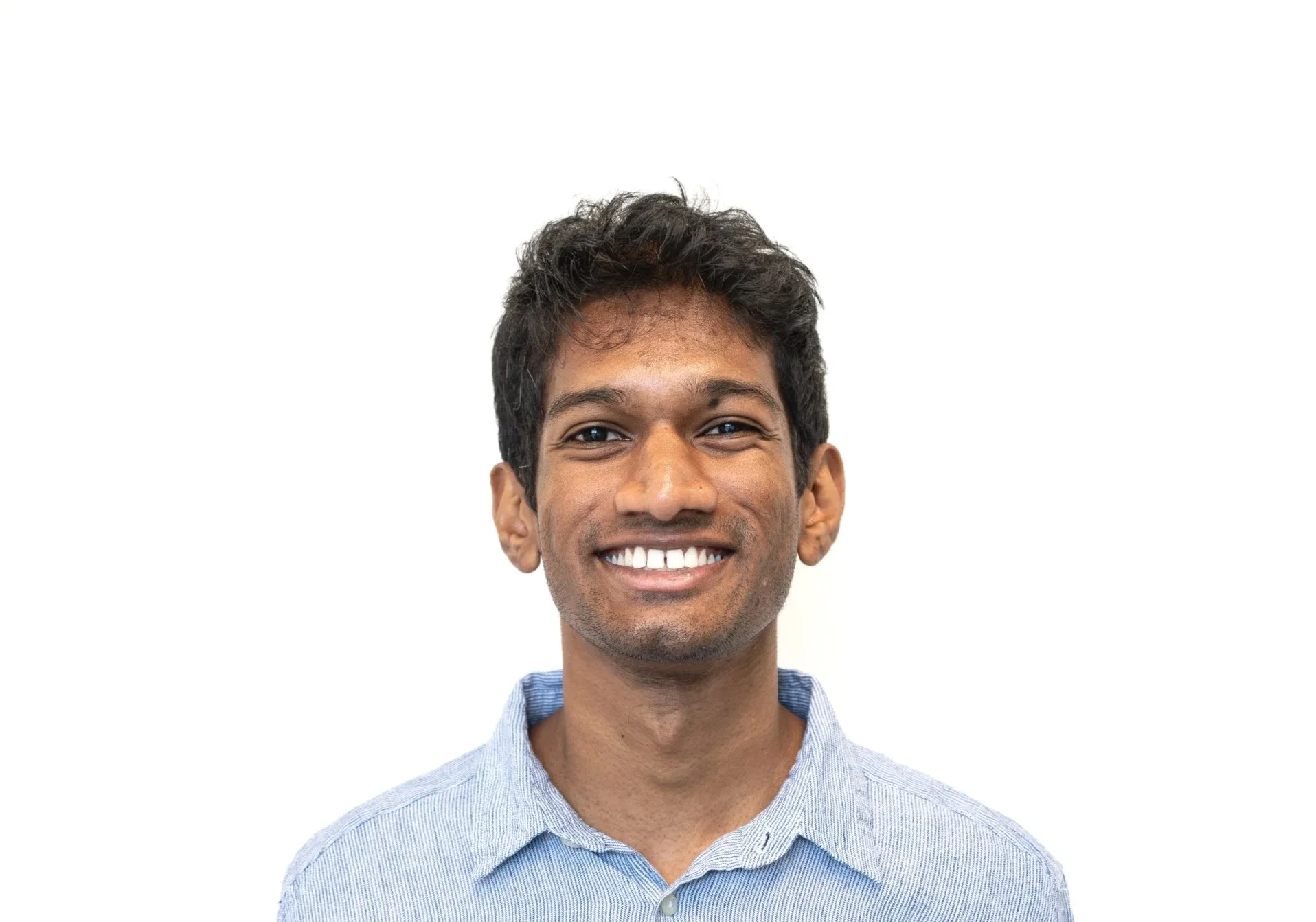 Portrait of one of our receptionist, Athavan Jegendran