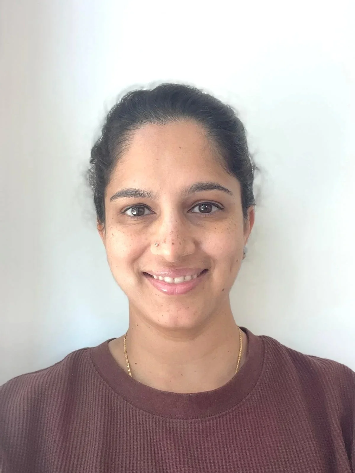 Portrait of one of our practice manager, Nohshini Palaniappan