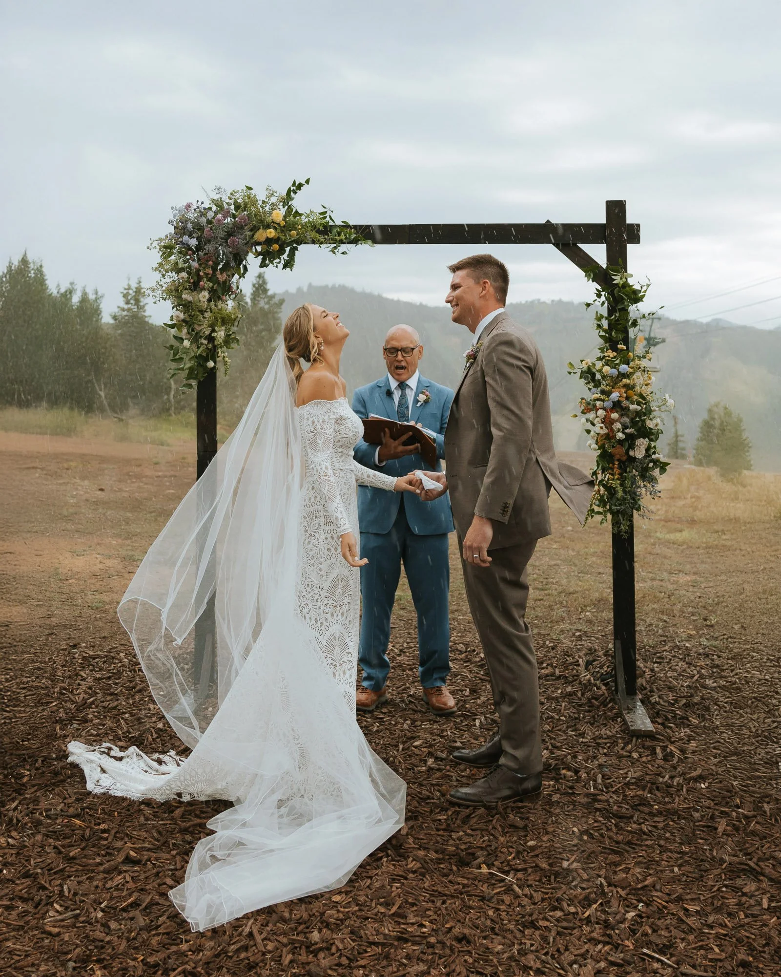 rainy wedding ceremony in the park city mountains