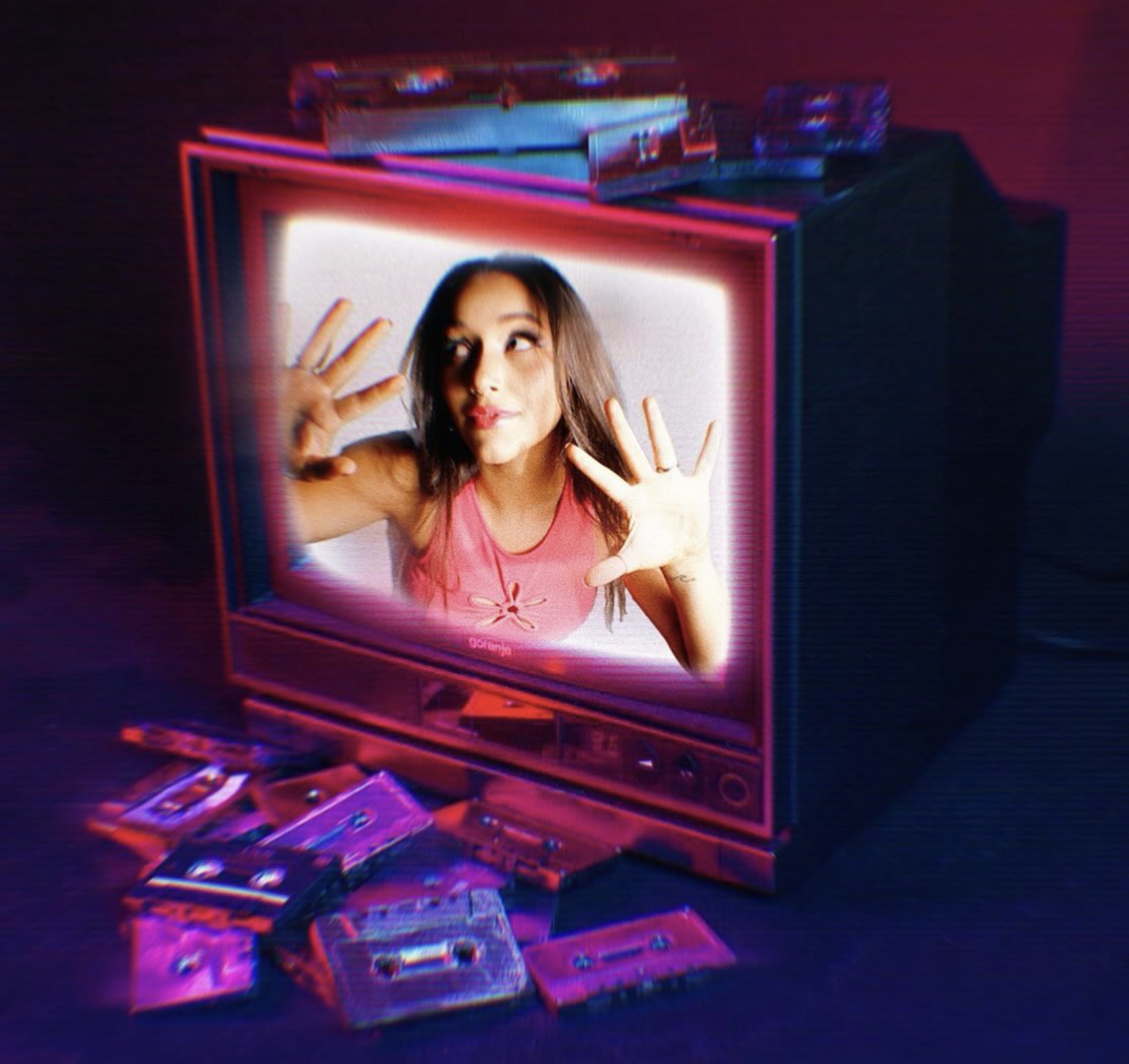 A woman appears on a vintage pink television screen, pressing her hands against the screen, surrounded by cassette tapes on a dark surface with neon and pink lighting. Y2K inspired photoshoot.