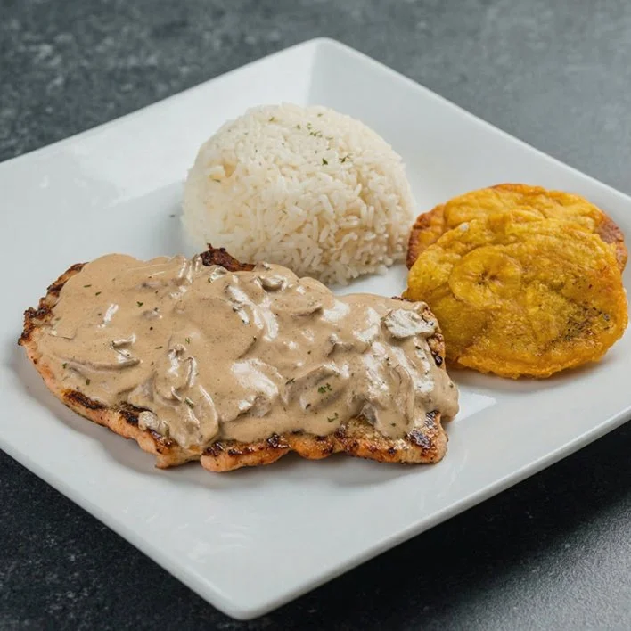 Bistec de Cerdo Salsa Champiñones