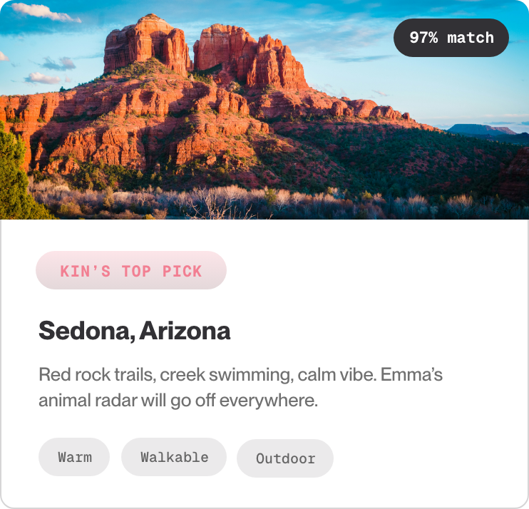 A scenic view of red rock formations in Sedona, Arizona during the daytime with blue sky and some clouds.