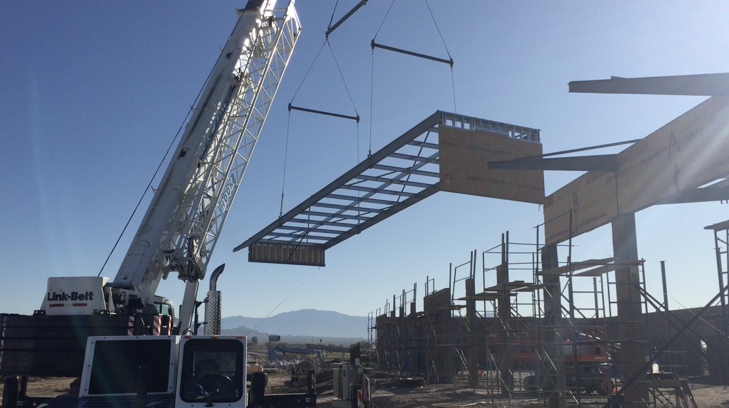 crane use during the construction of the dan post transportation center 