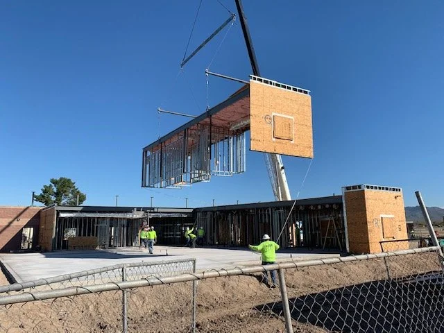 crane lifting in a factory built building as part of a school renovation project
