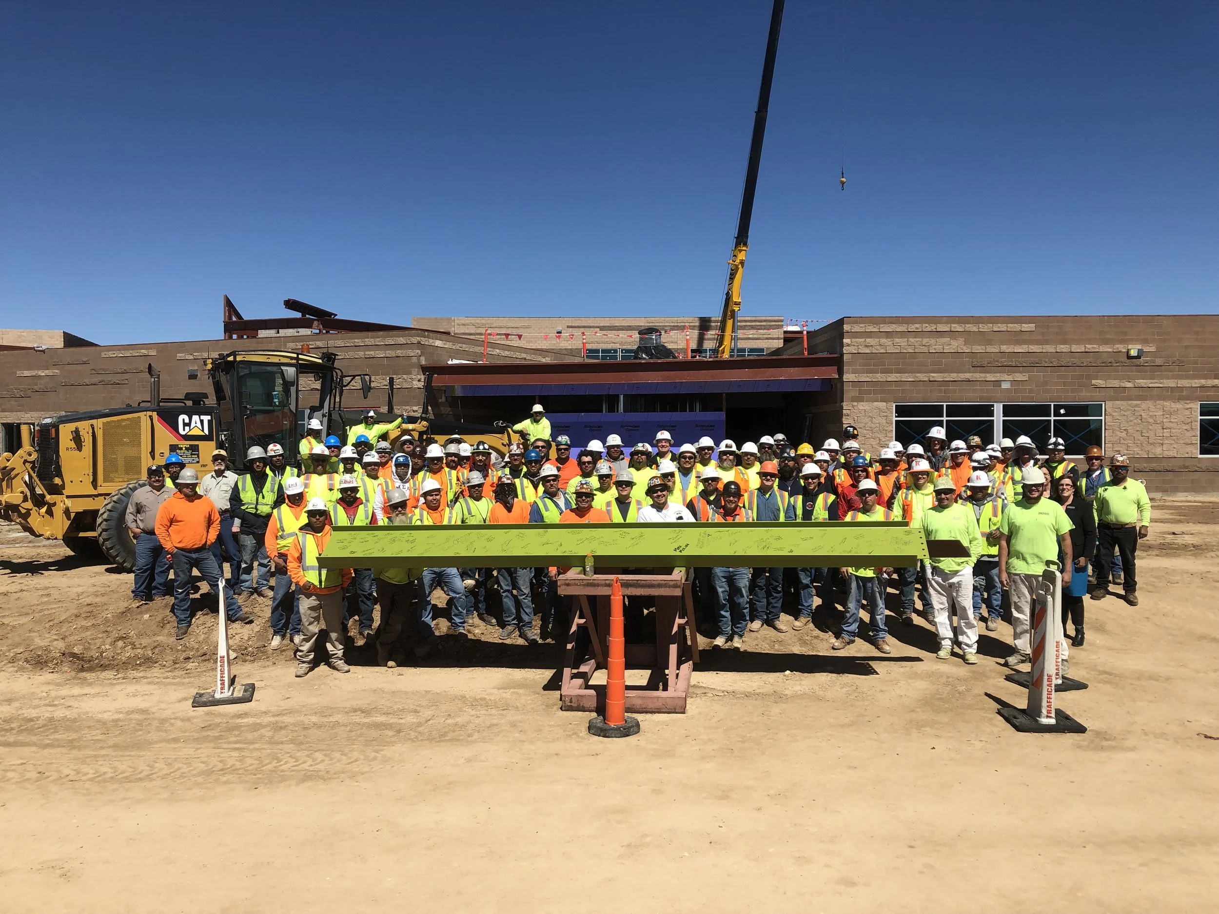 Last structural Beam going into DMK8 signed by all the builders and owners
