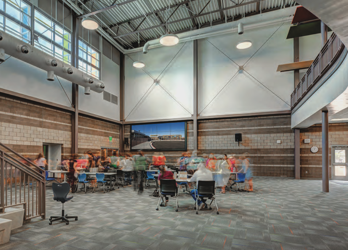collaborative open space at a recently opened elementary school full of people