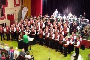 Band and choir performing together