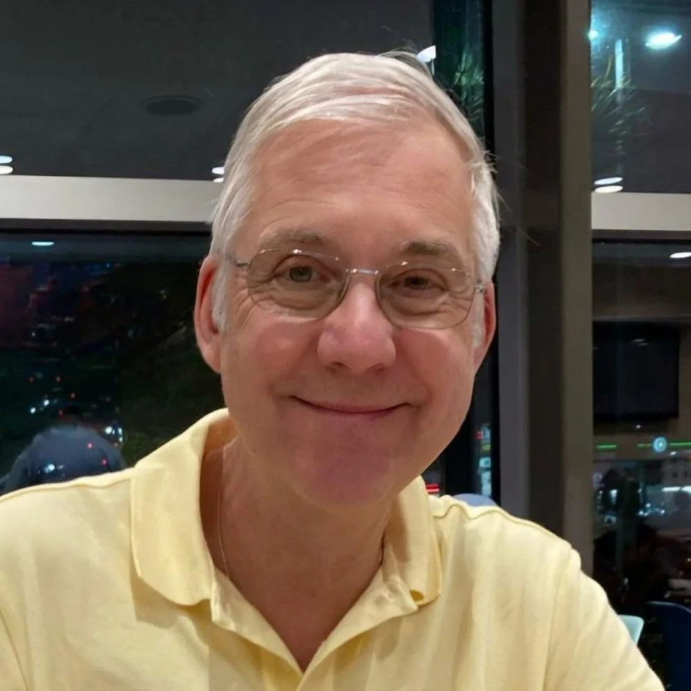 Profile of smiling man Graham