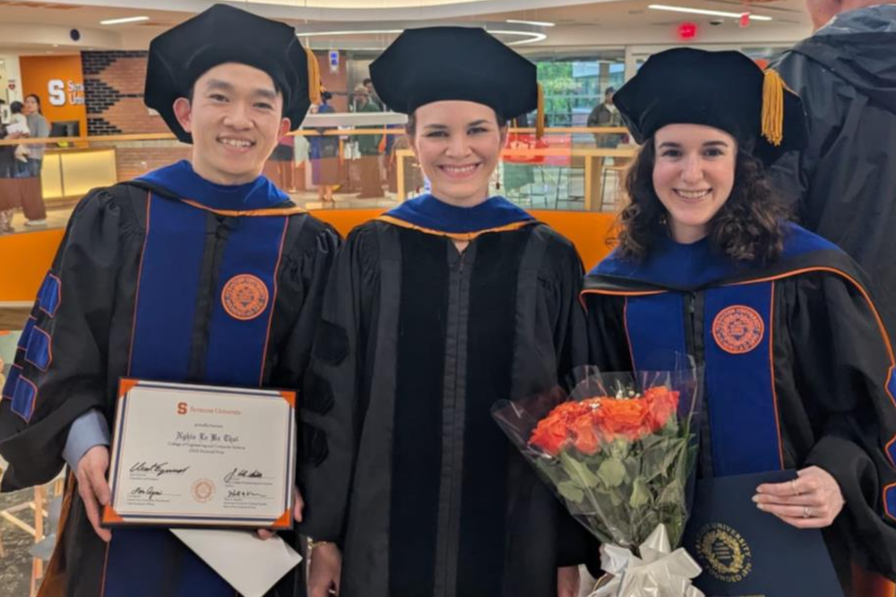 Natalie and Nghia are officially hooded!