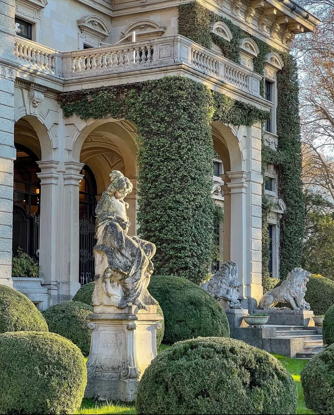 English estate, ivy on columns, old statues