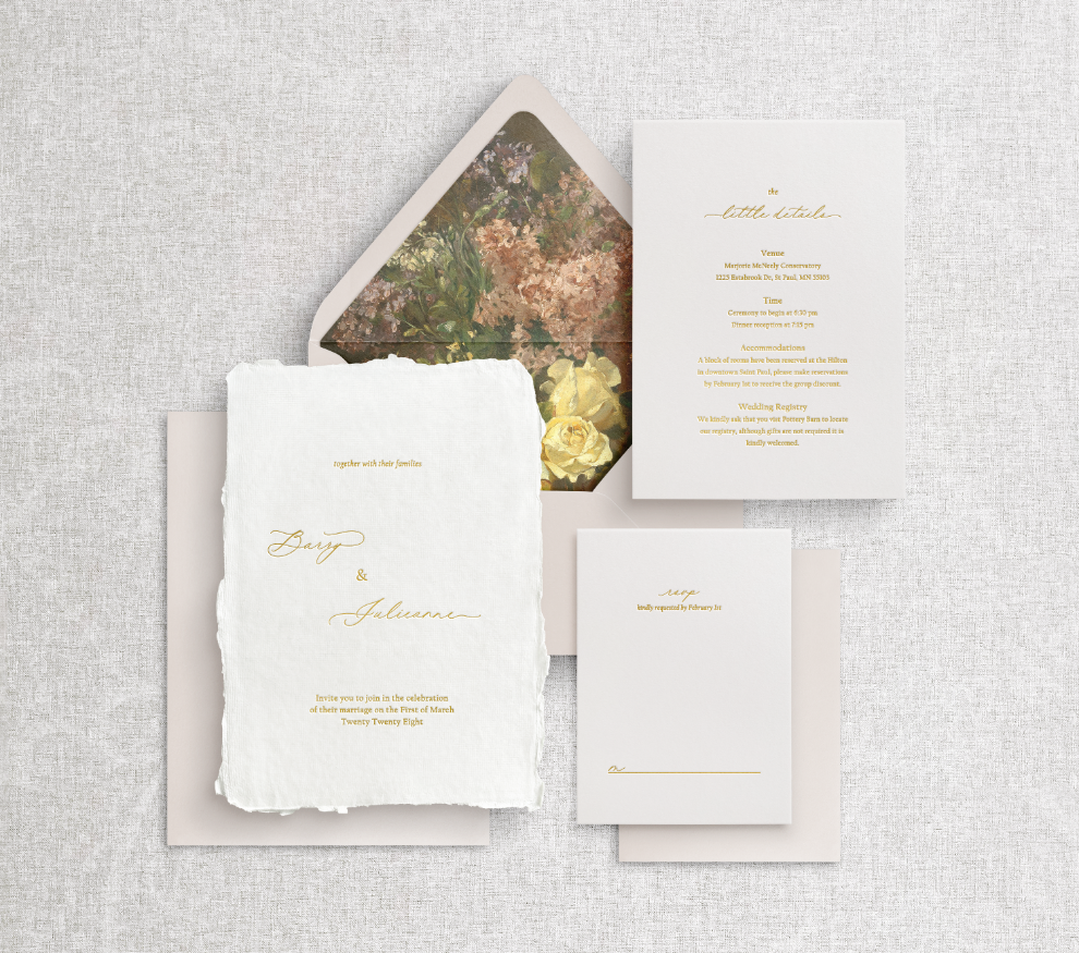Signature fine art wedding invitation with gold foil calligraphy, champagne beige envelopes, and a vintage floral painting envelope liner on white textured cardstock.