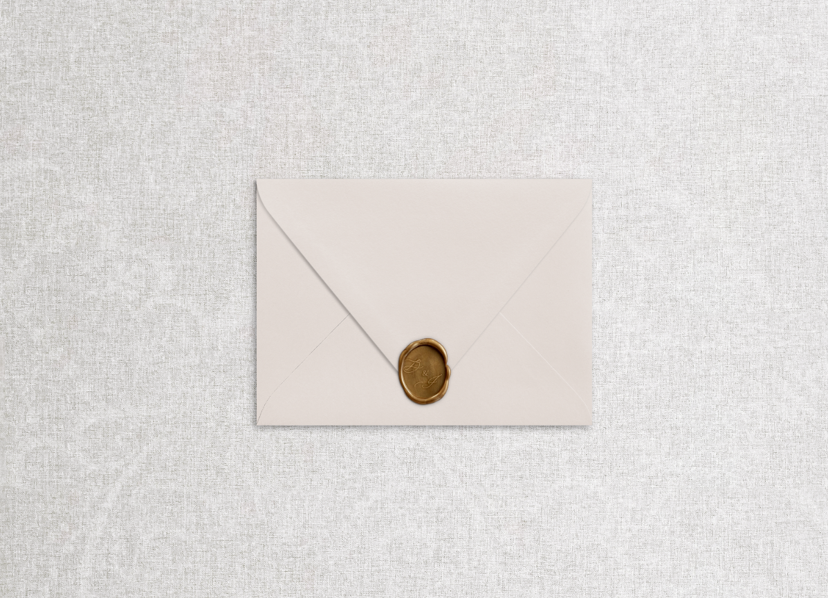 Foil printed return address on champagne beige envelope in the style of "head over heels" suite.