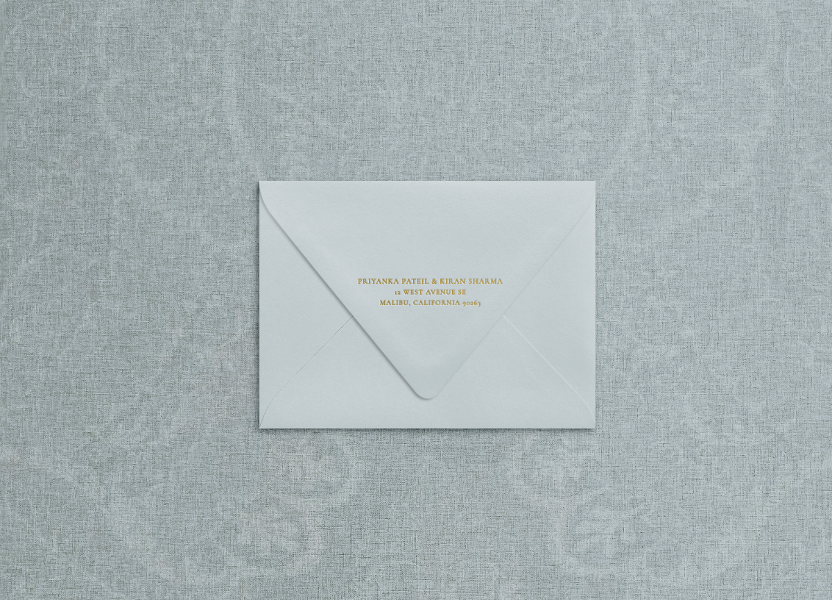 Foil printed return address on blue envelope in the style of "flora de la mer" suite