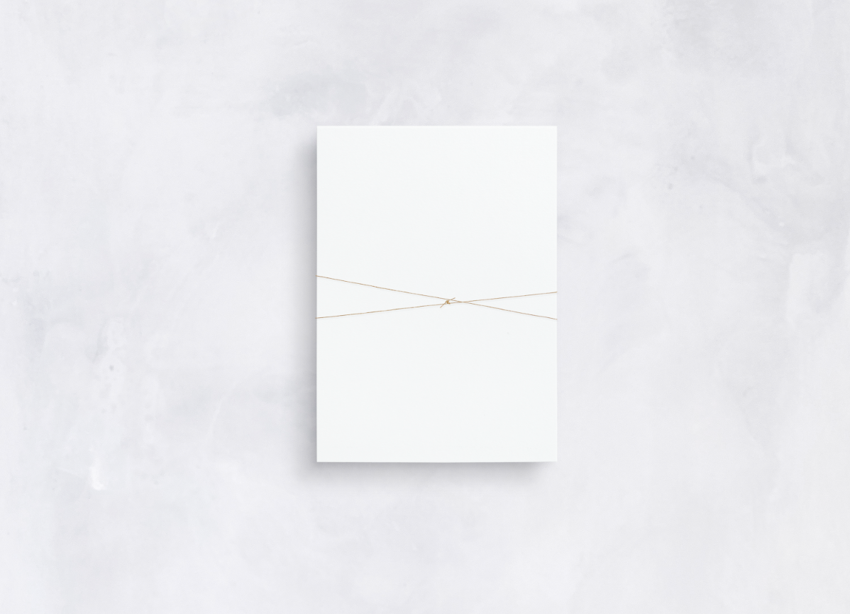 White twine double wrapped in decorative knot