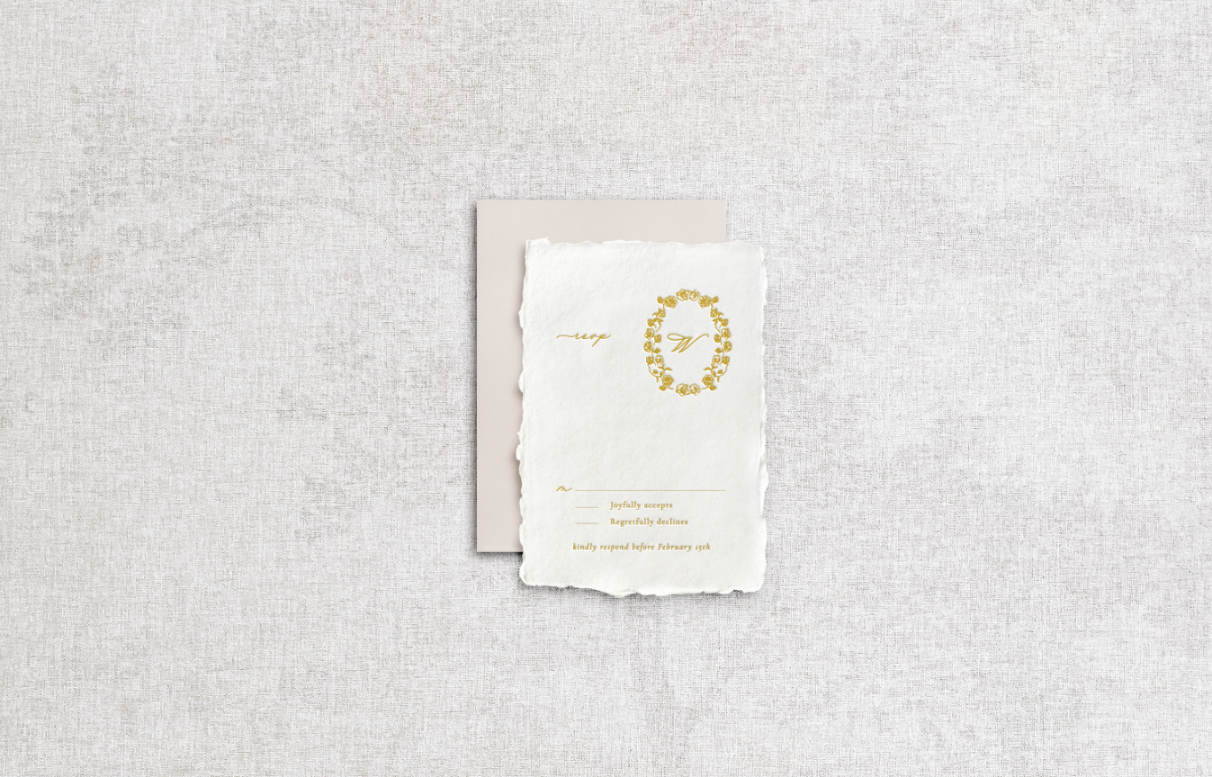Details card on white handmade paper with mixed typography including calligraphy printed using gold foil letter press with champagne beige envelope on neutral background.
