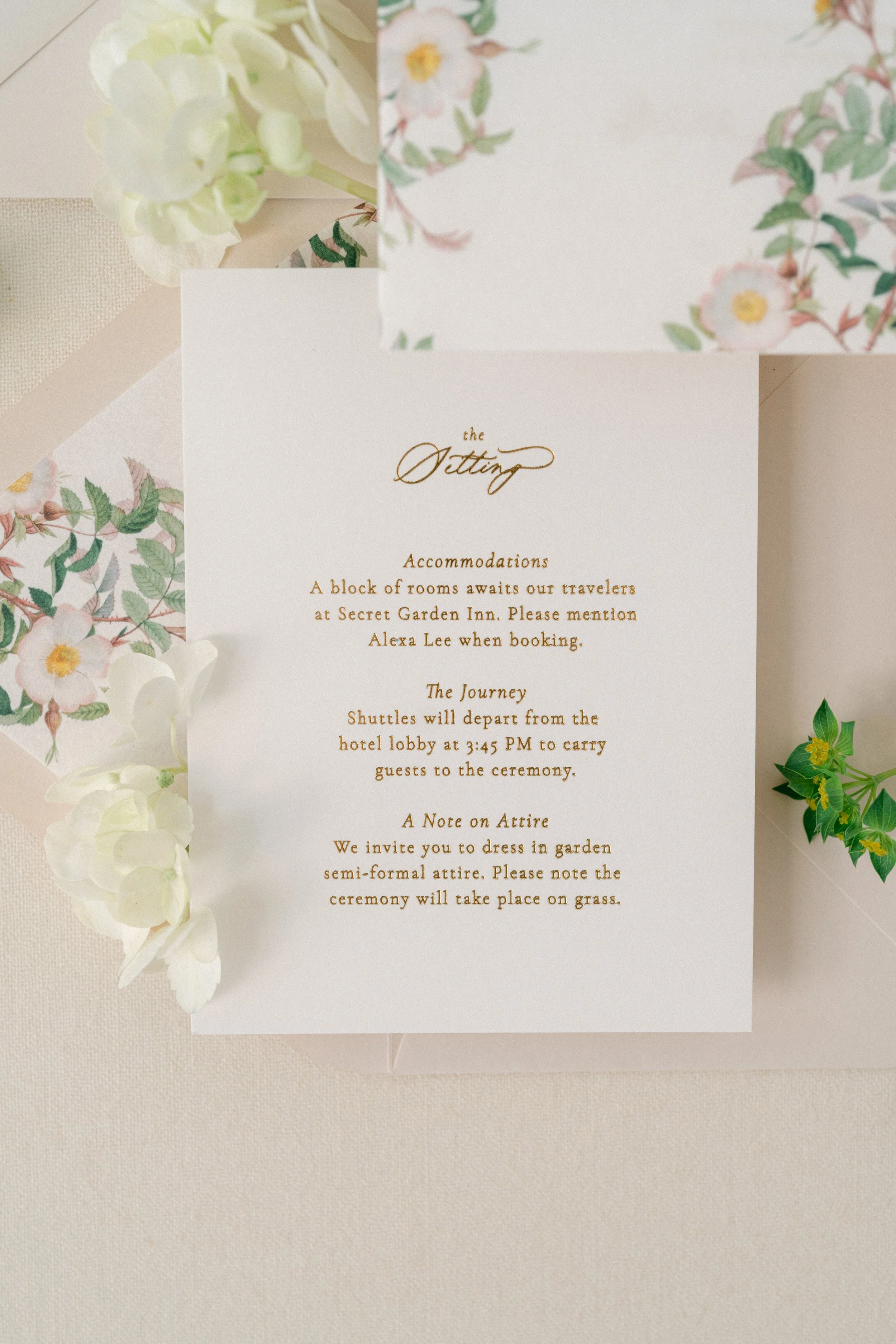 Foil detail card close up flat lay wedding invitation