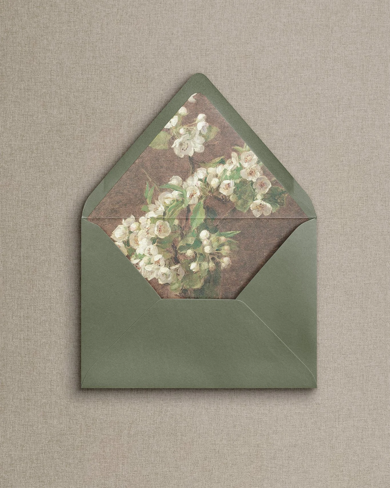 Elegant, simple wedding invitation envelope with a beautiful floral liner, perfect for luxury wedding stationery.