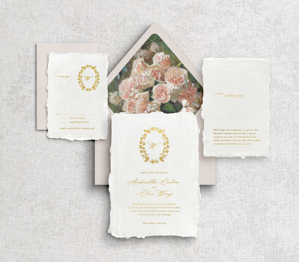 Signature romantic wedding invitation suite with gold foil calligraphy, champagne envelopes, and a vintage rose garden envelope liner on white textured paper.