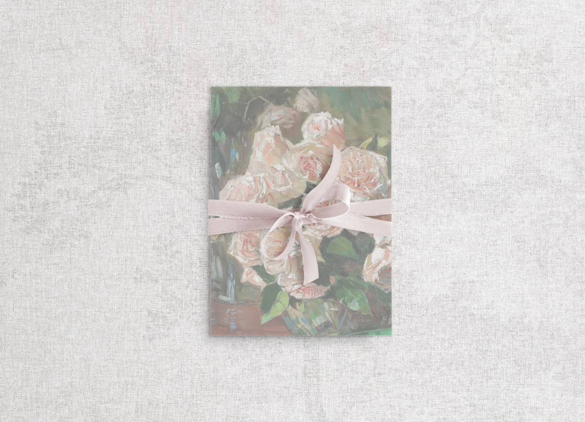 This romantic and elegant wedding stationery features a feminine floral vellum wrap tied with a delicate silk ribbon.