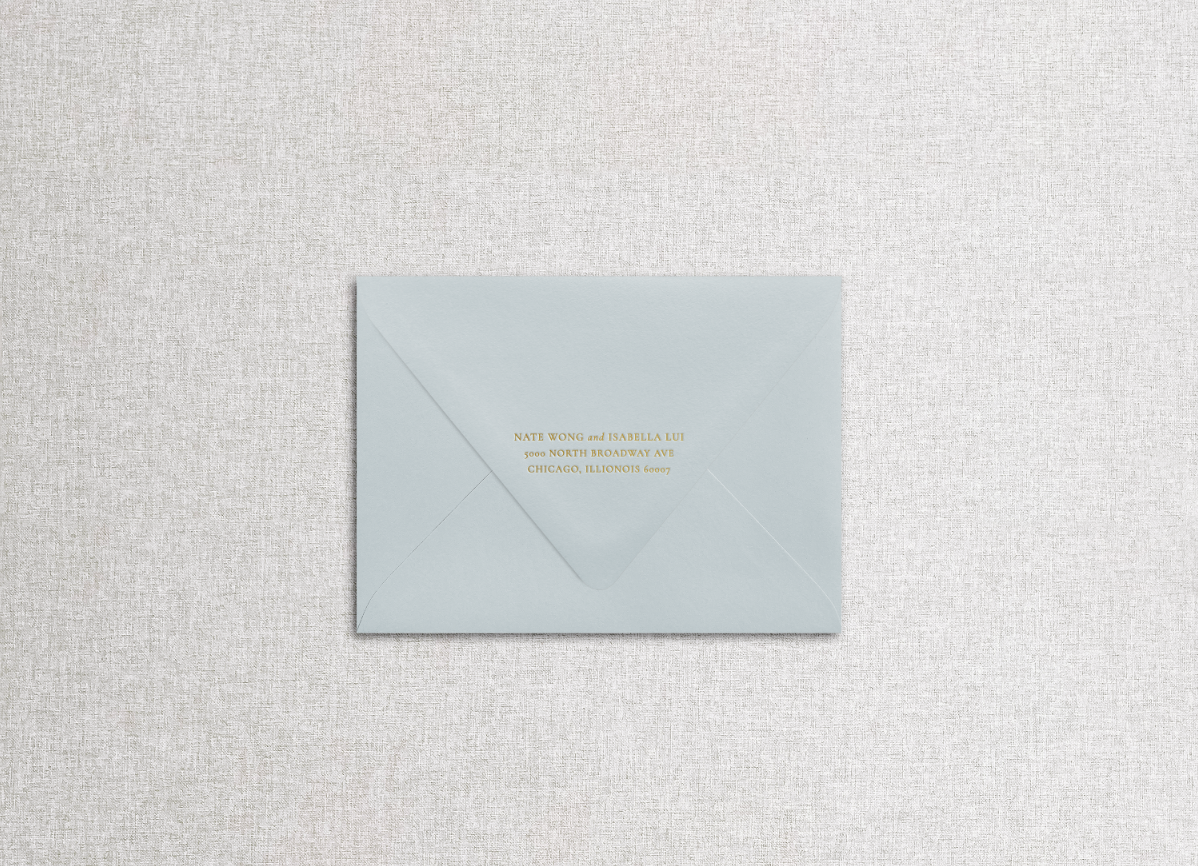 Foil printed return address on blue envelope in the style of "morning dew" suite