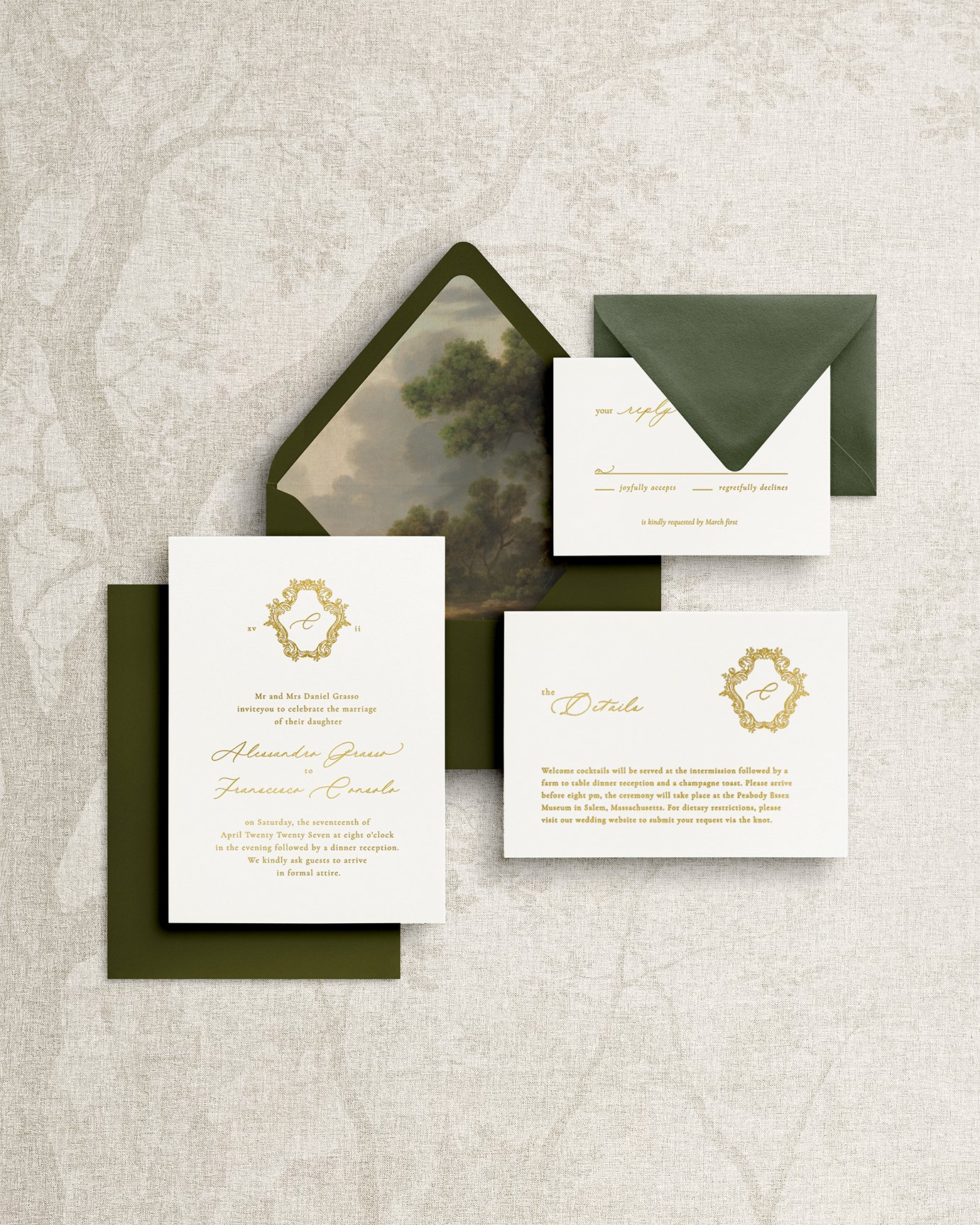 Signature invitation suite with soft white cardstock, deep green envelope, landscape liner, heirloom crest gold foil letterpress, and medium green return envelope.