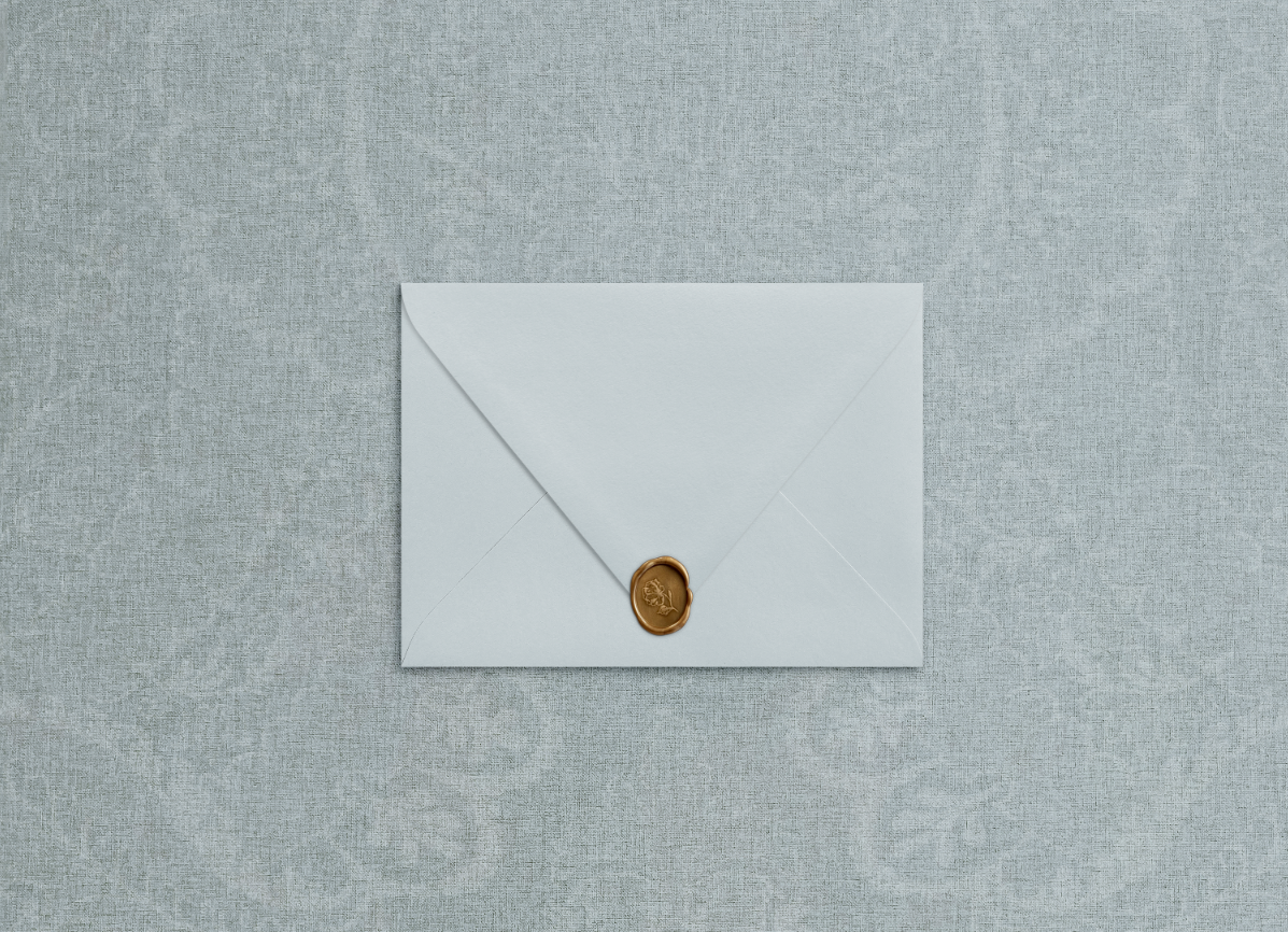 Wax seal on blue envelope in the style of "flora de la mer" suite.