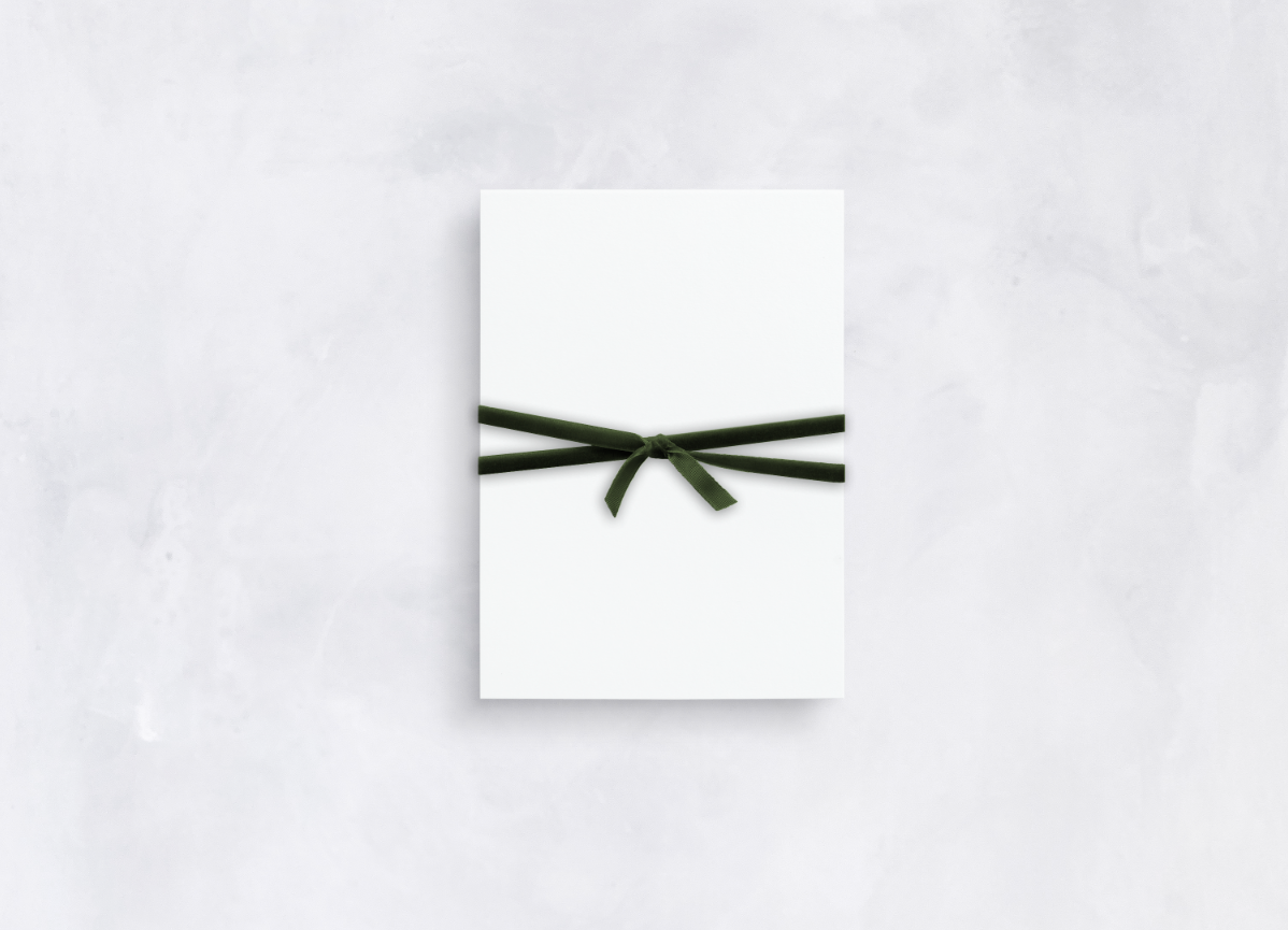 Emerald green velvet ribbon double wrapped in decorative knot