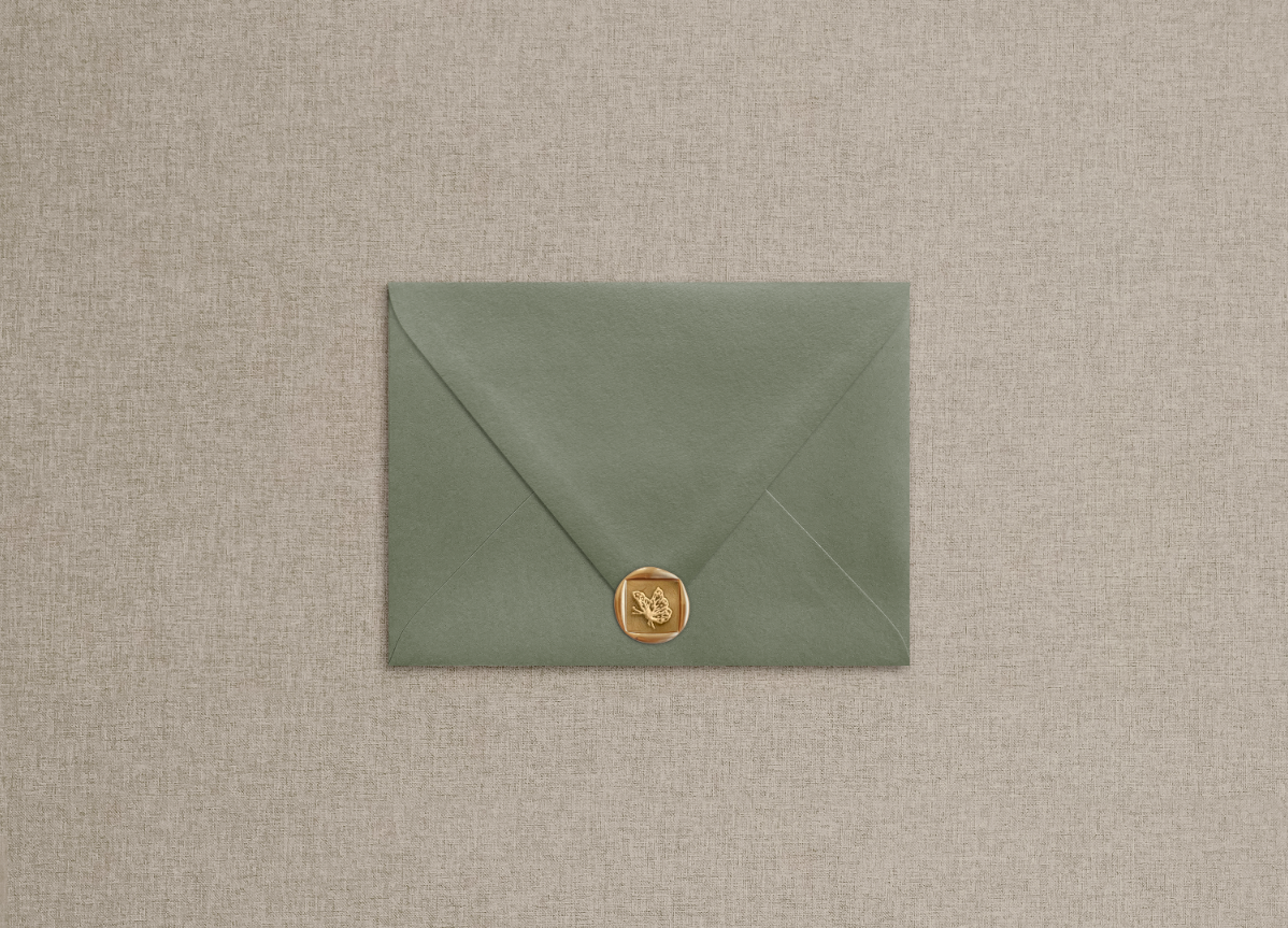 Wax seal on olive green envelope in the style of "a very English garden" suite.