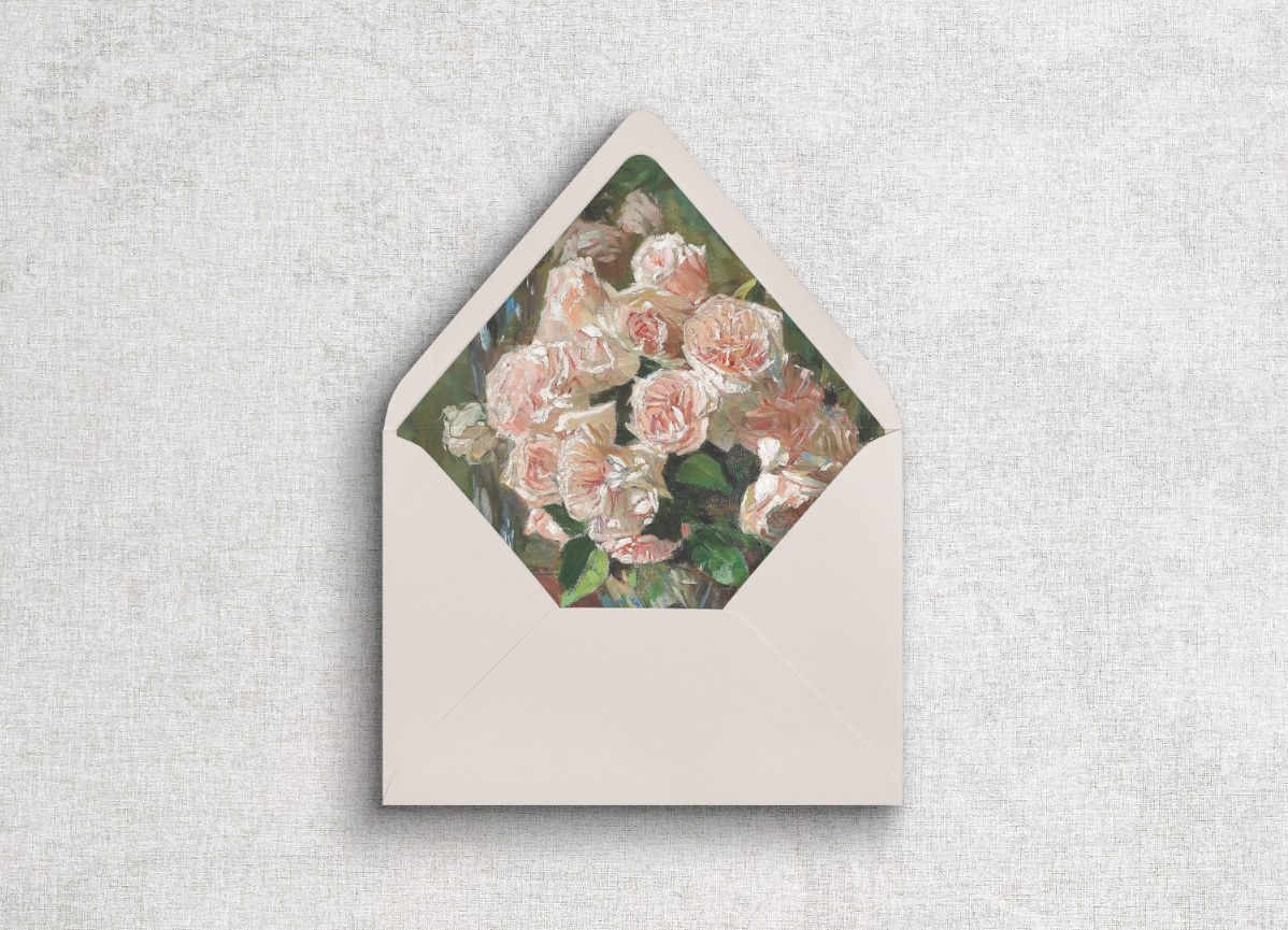 A7 euro flap champagne beige envelope with floral liner on neutral gray background.