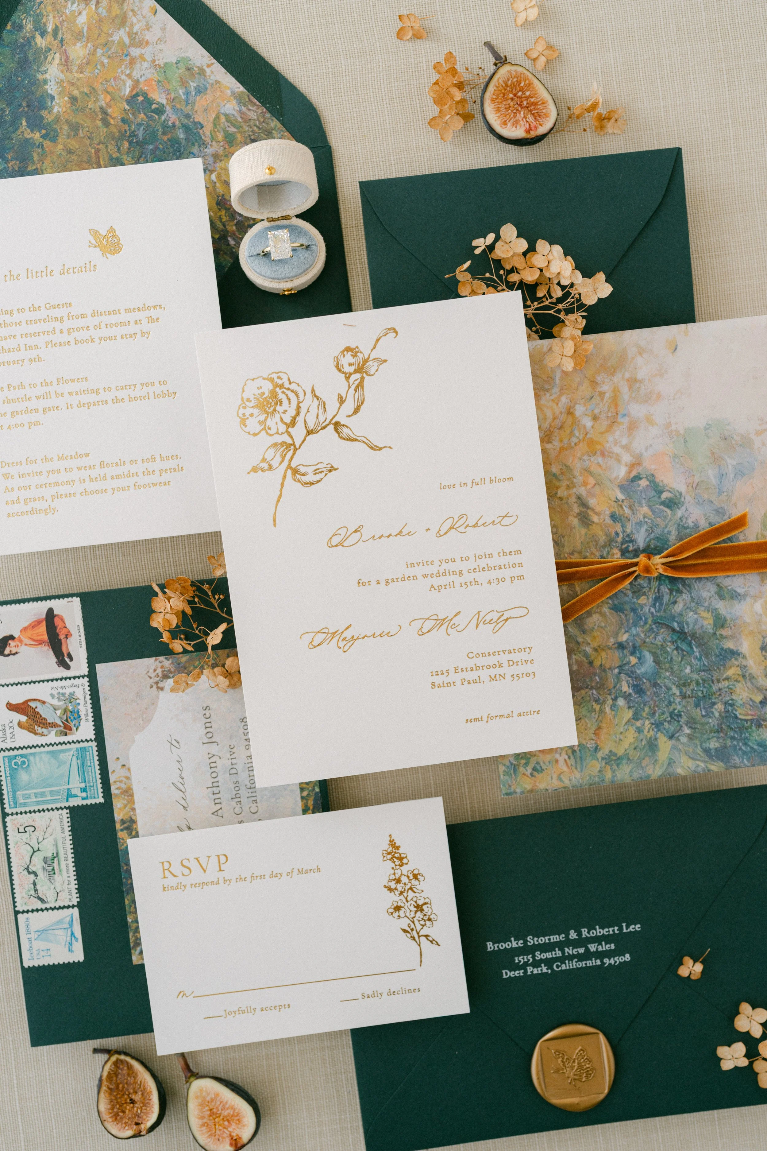 Close up shot fall garden flatlay wedding invitations
