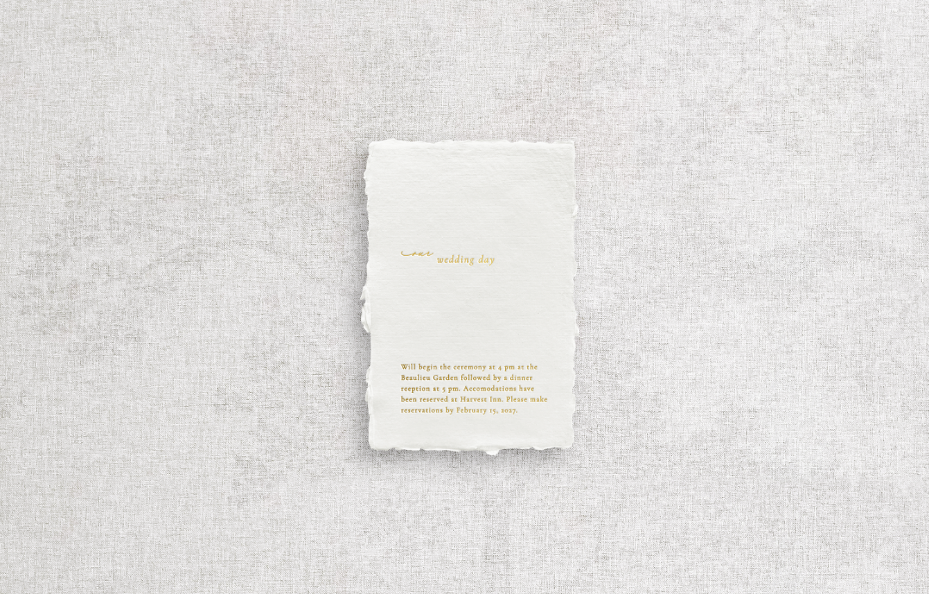 Details card on white handmade paper with mixed typography including calligraphy printed using gold foil letter press on neutral background.