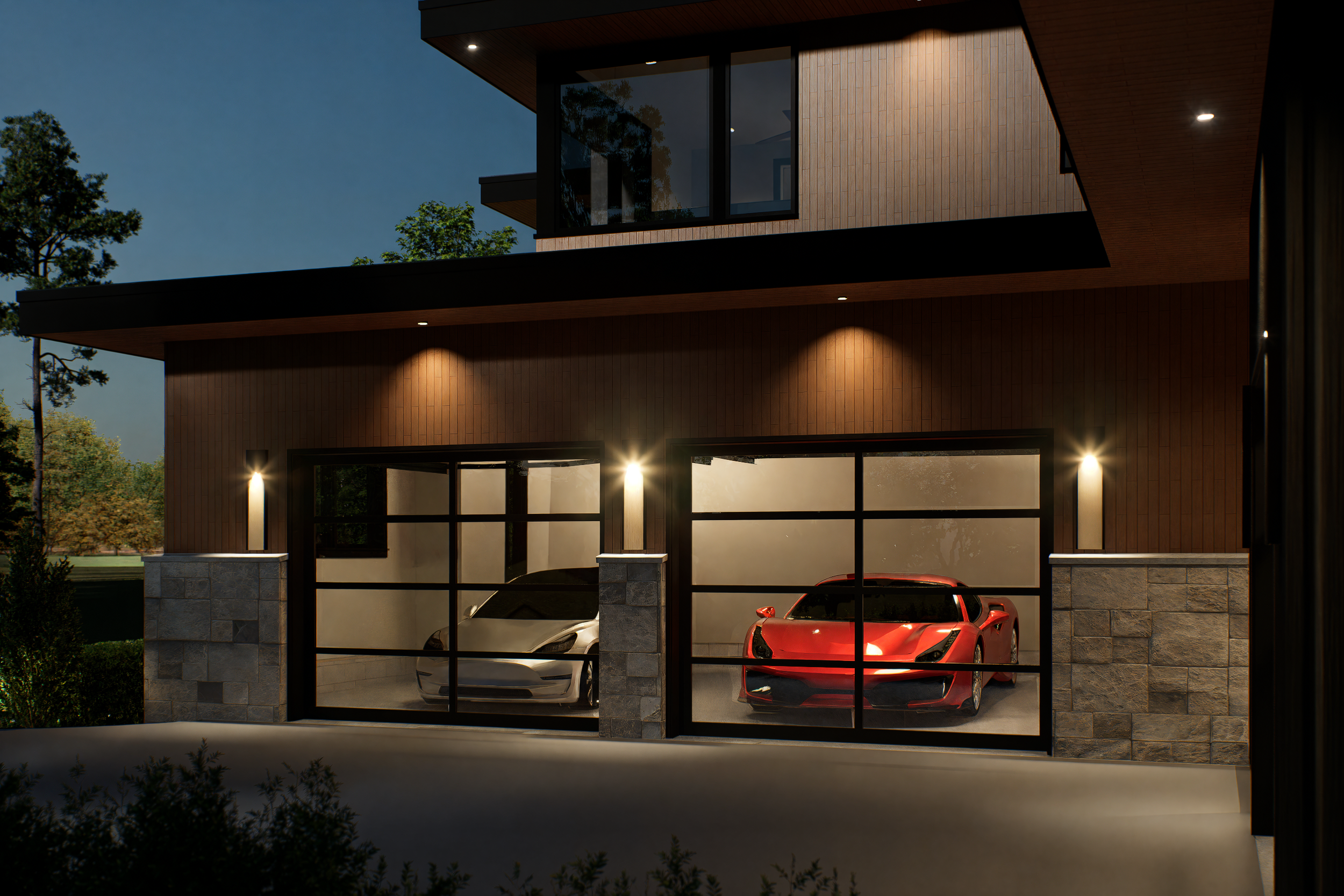 Modern house with large glass garage doors containing two sports cars, one silver and one red, illuminated at night with exterior lighting.