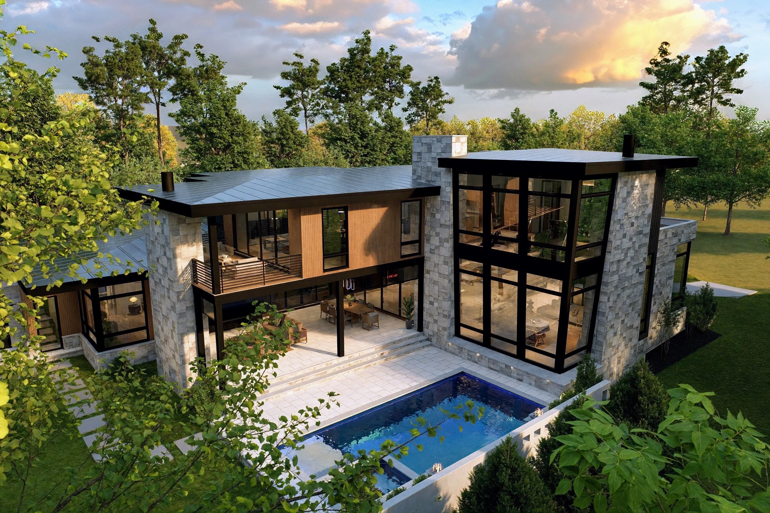 A modern two-story house with large glass windows, stone exterior walls, a swimming pool, surrounded by green trees and grass, during sunset.